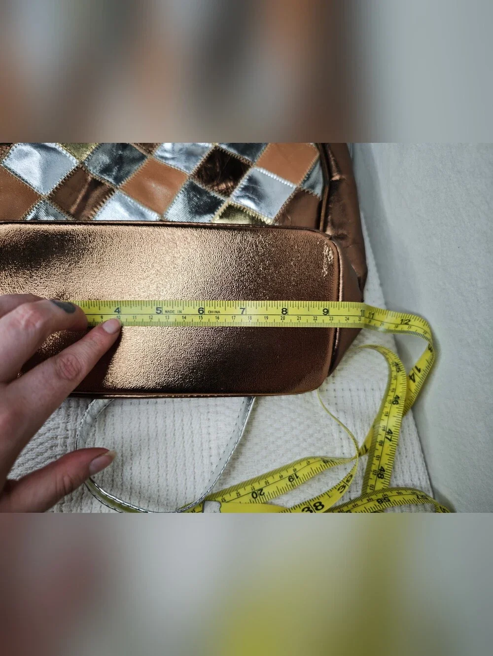 Fifth Avenue Handbags multi metallic leather bucket bag